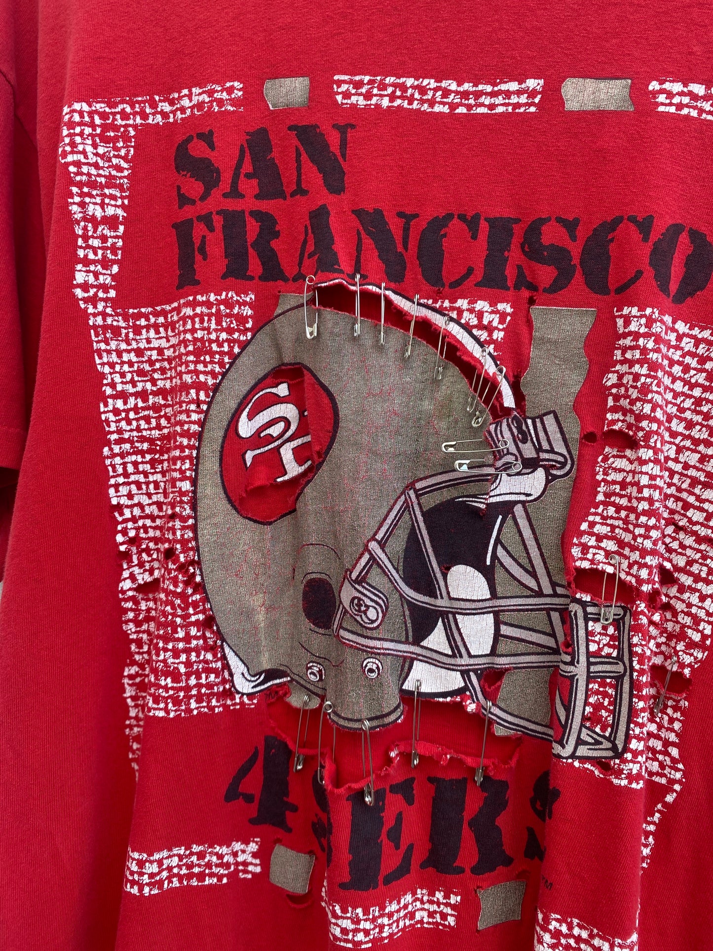 Vintage distressed and safety pin repaired San Fransisco 49ers Tshirt Large